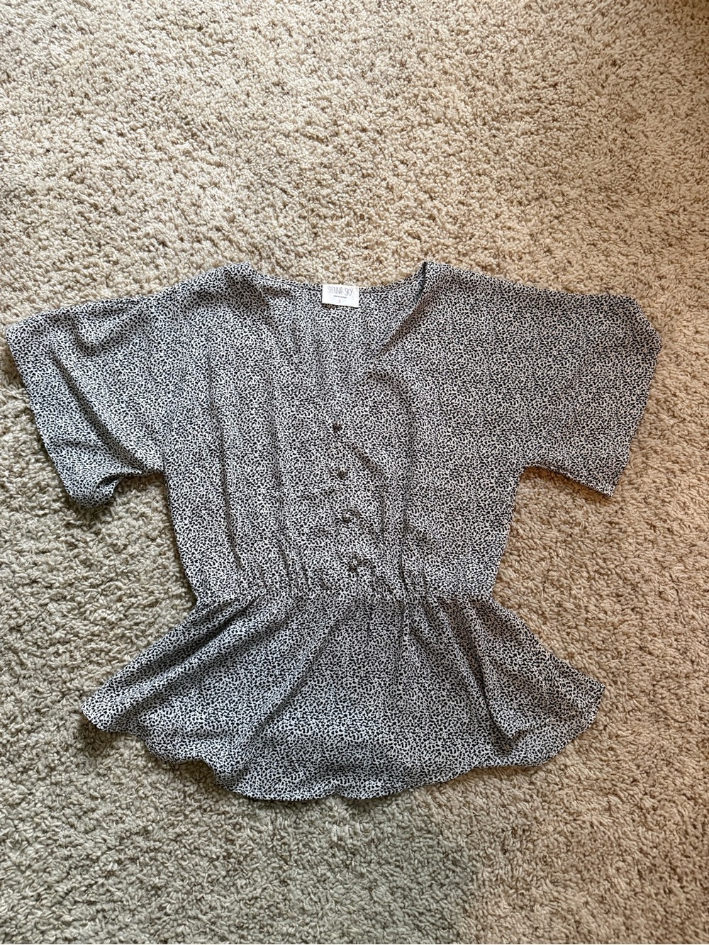 Sienna Sky Black and White Button-Front Peplum Blouse